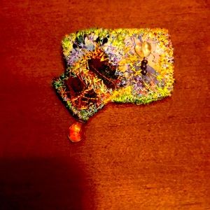 Broach with amber  briolette